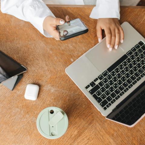 image of person using laptop phone and tablet