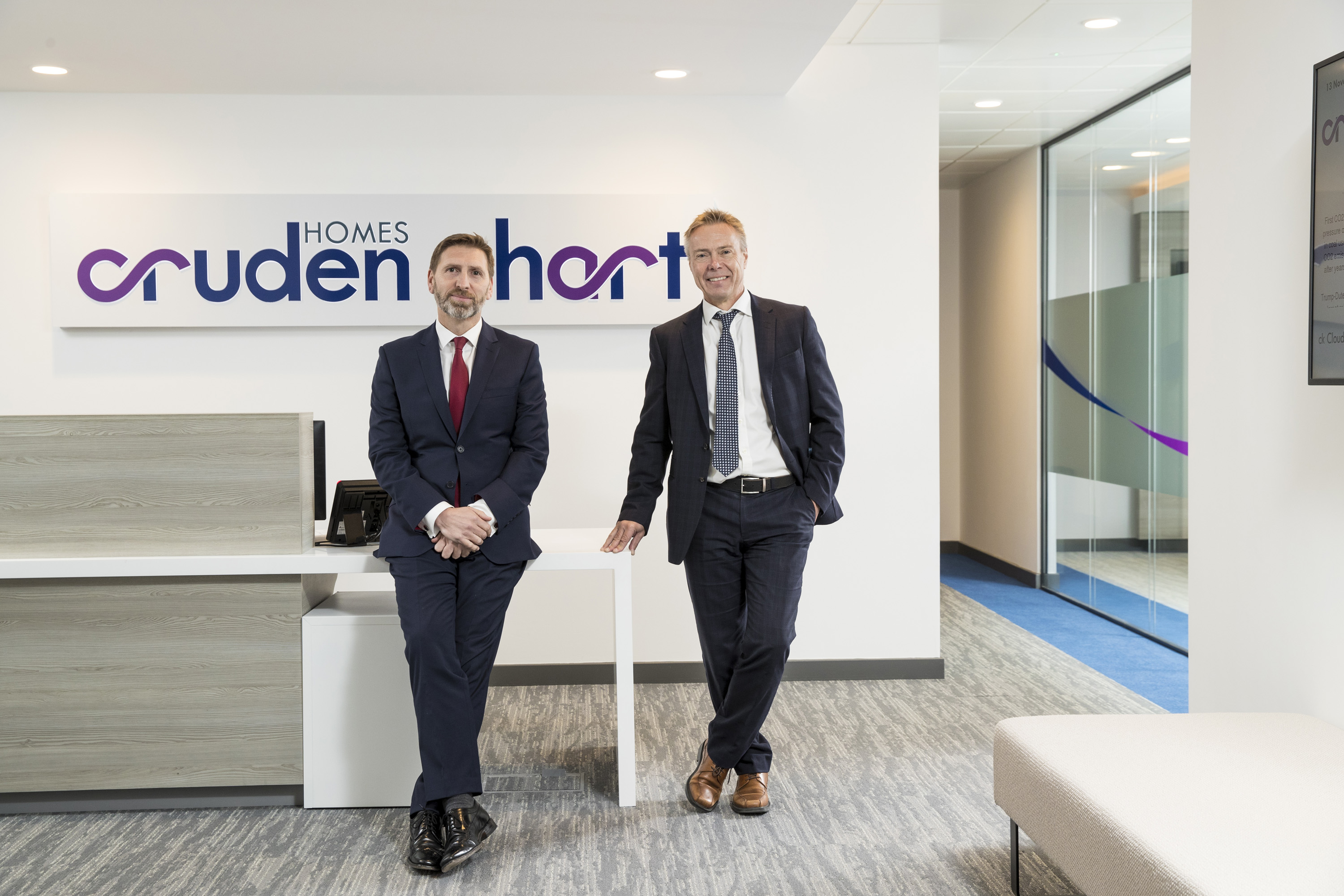 Steven Simpson (left), managing director of Cruden Homes (East) Ltd and Colin Macdonald, managing director of Hart Builders at the new Cruden House reception. 