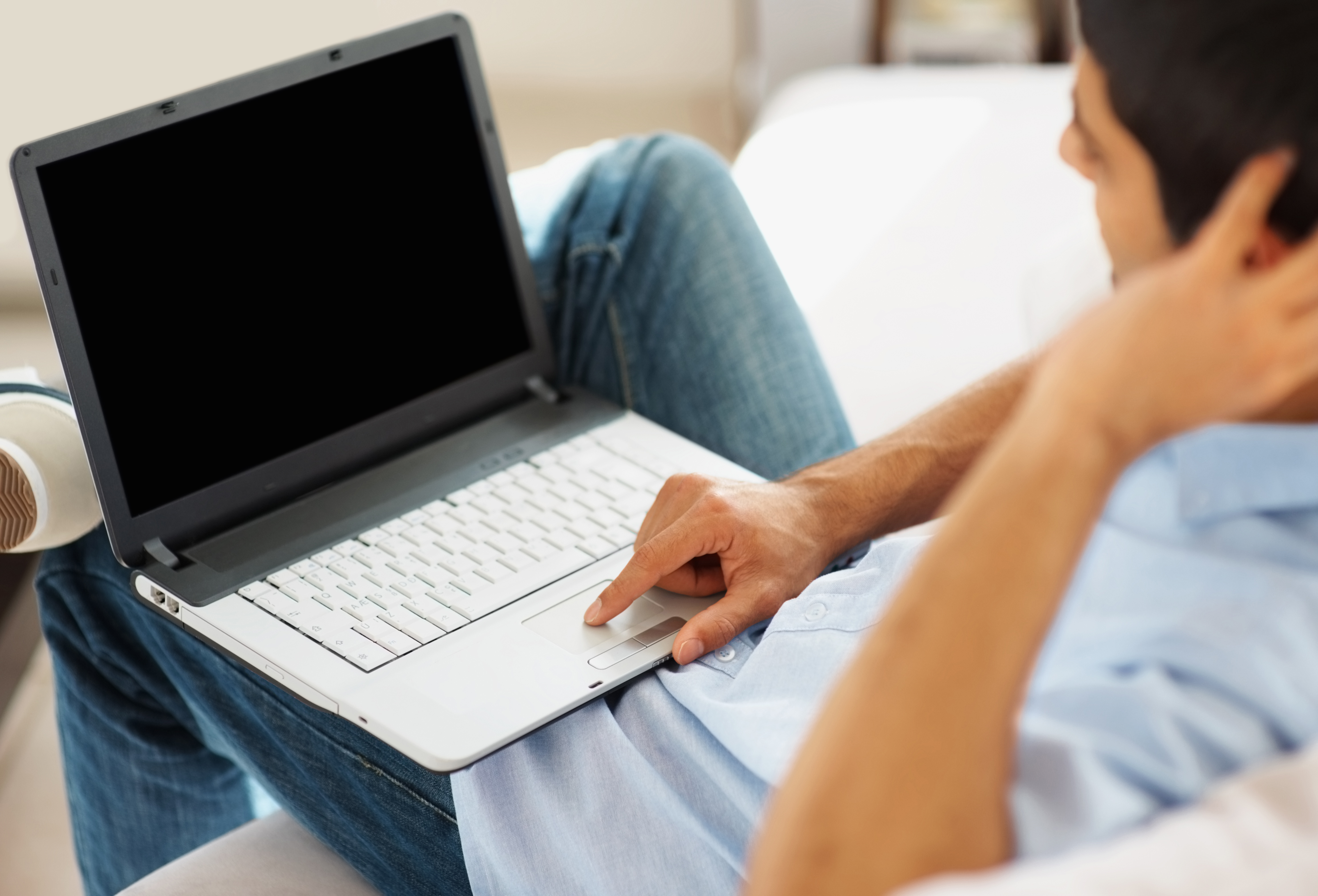 man using laptop