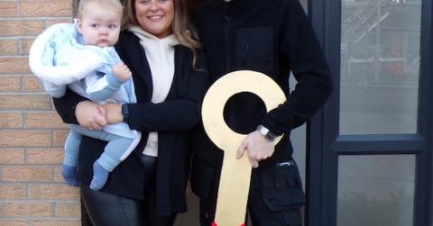 Sianice and Aiden with Blake outside their new home